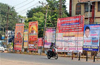 Enforcement of law regarding buntings, flexes, banners in city